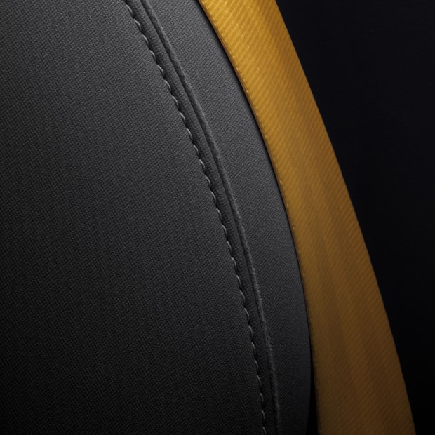 Polestar gold seatbelt close-up