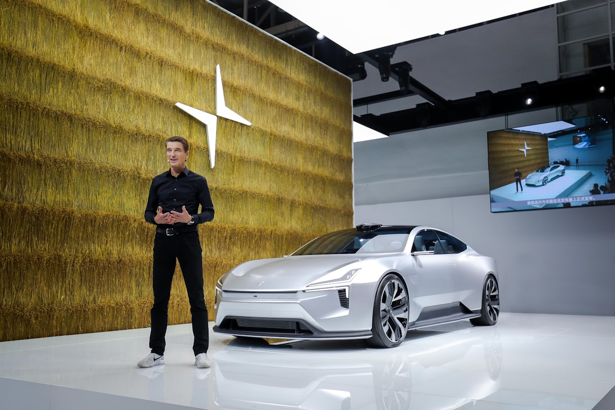 Thomas Ingenlath speaking in front of a Polestar Precept at the 2020 Beijing Auto Show.