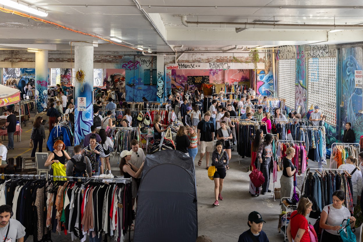 People shopping inside a second hand shop.