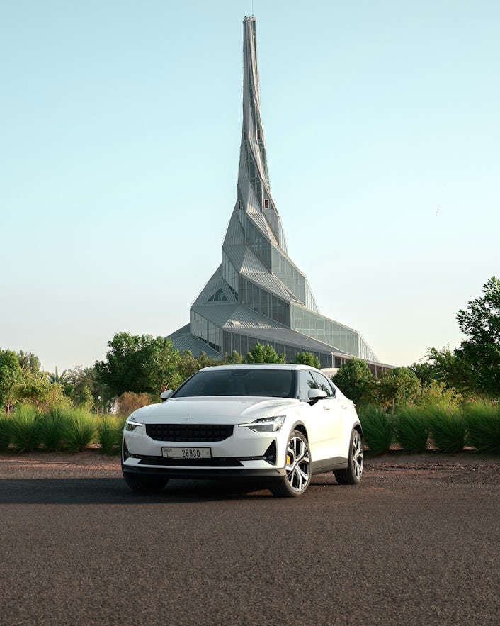 Polestar 2 infront of solar park.