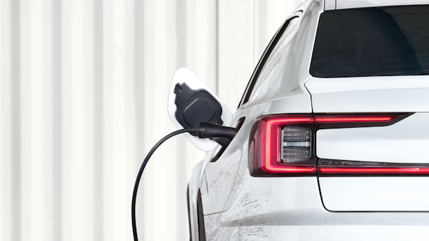 White Polestar with pluged in charger