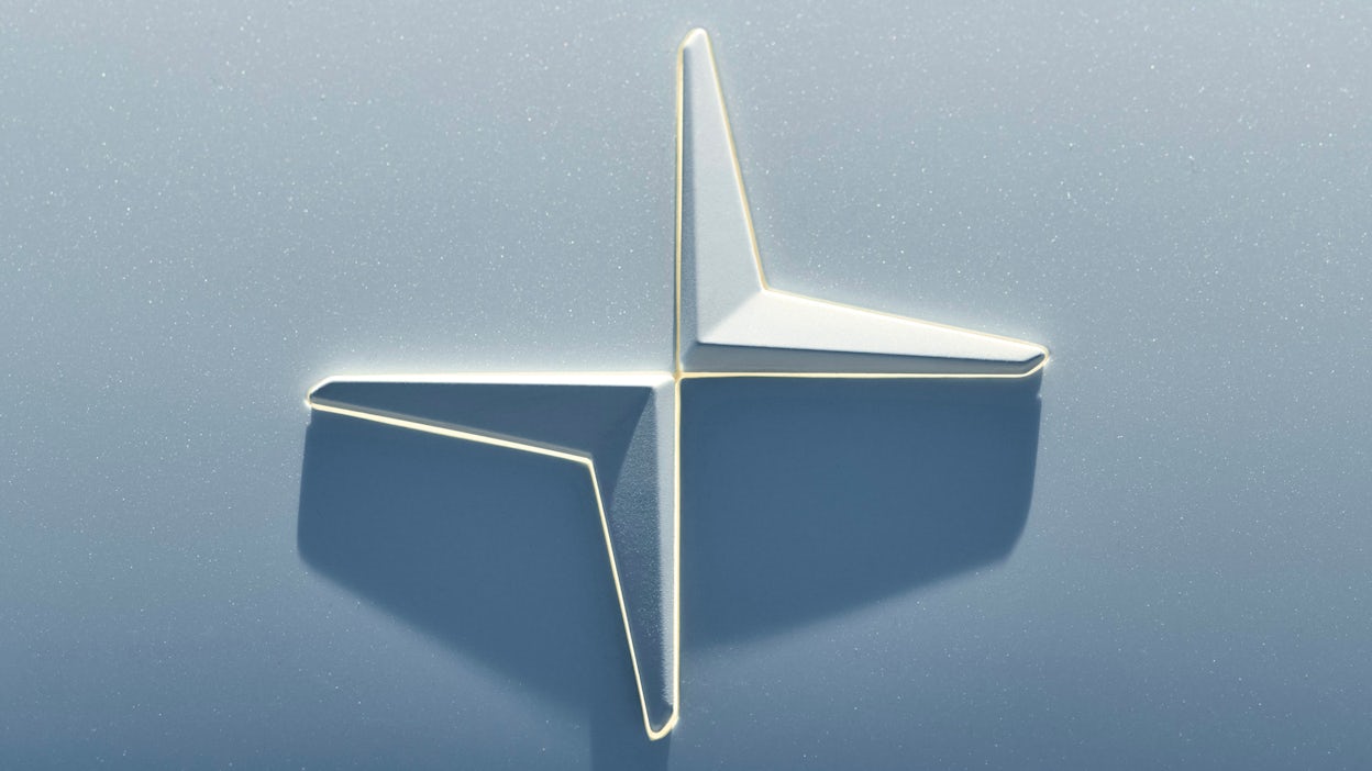 Close-up of the Polestar star logo on a Polestar 4