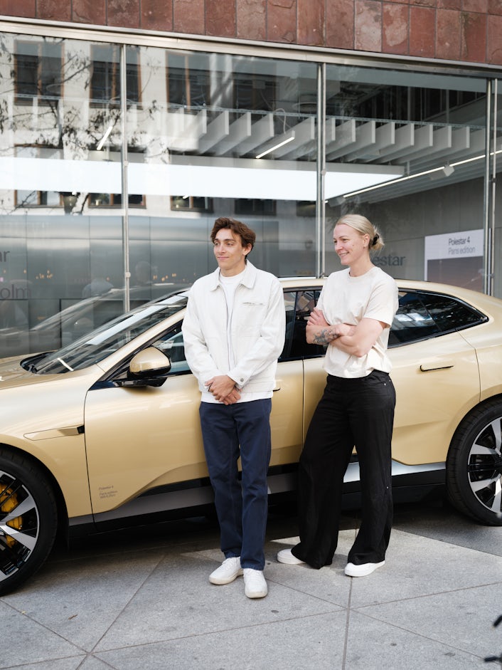 Armand Duplantis and Sarah Sjöström in front of gold Polestar 4.