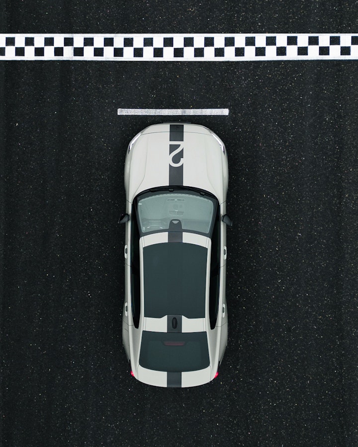 Birds eye view of Polestar 2 on race track pole position