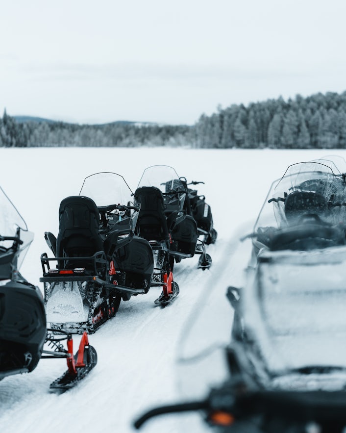 Rows of parked snowmobiles